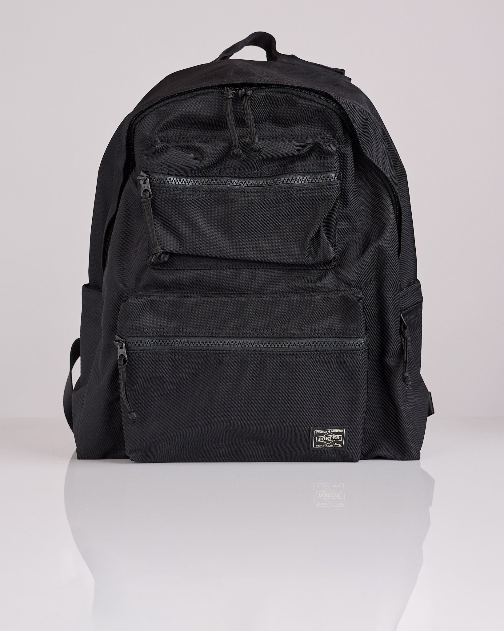 Porter Unit Dual Front Pocket Daypack Black – LESS 17 Porter Unit Dual Front Pocket Daypack Black – LESS 17