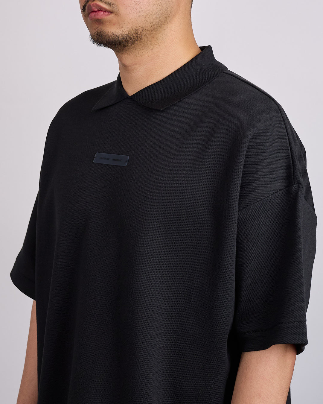Fear of God Essentials 90's Fit Pique Polo Shirt Jet Black