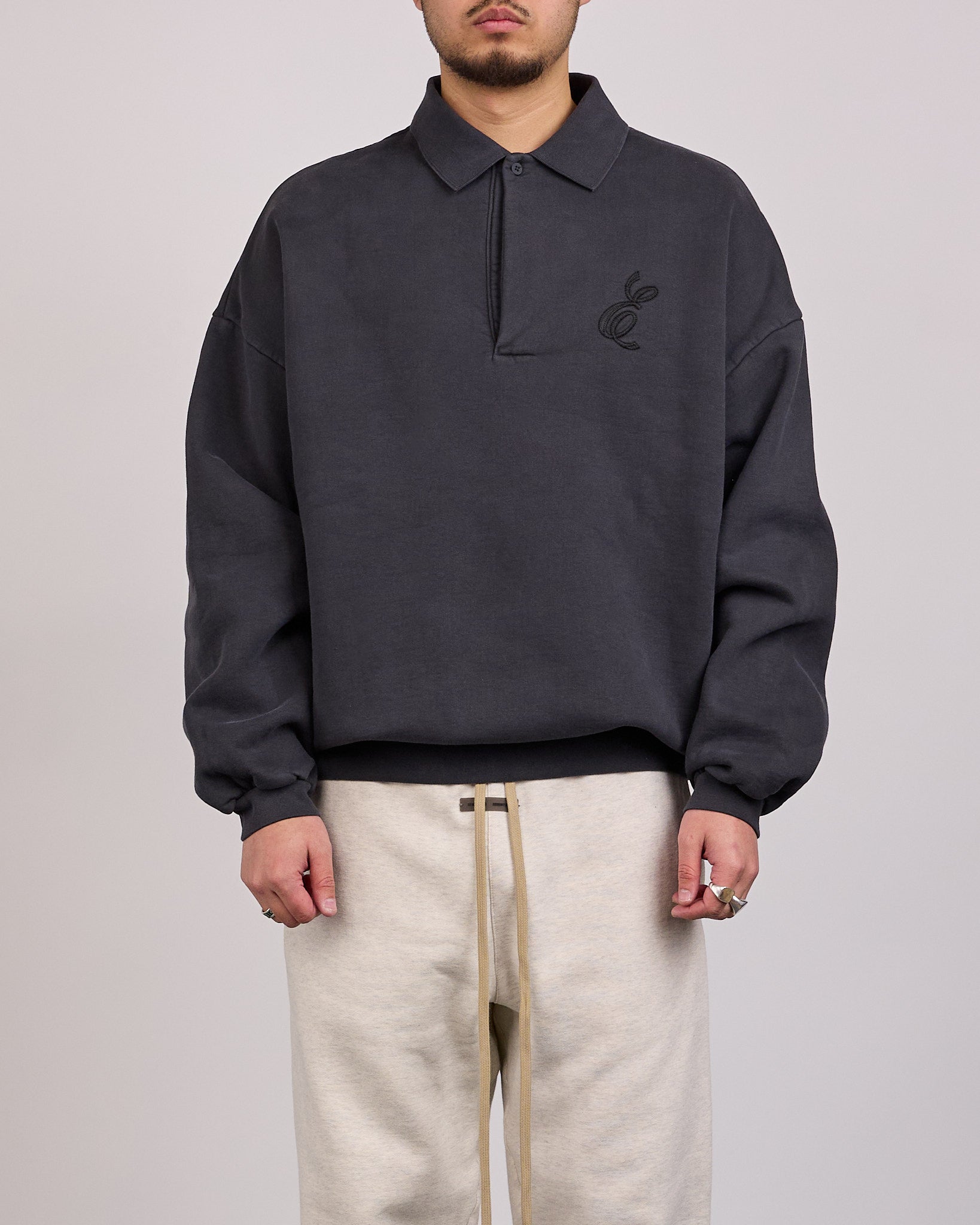Fear of God Essentials Classic Polo Sweatshirt Vintage Black – LESS 17