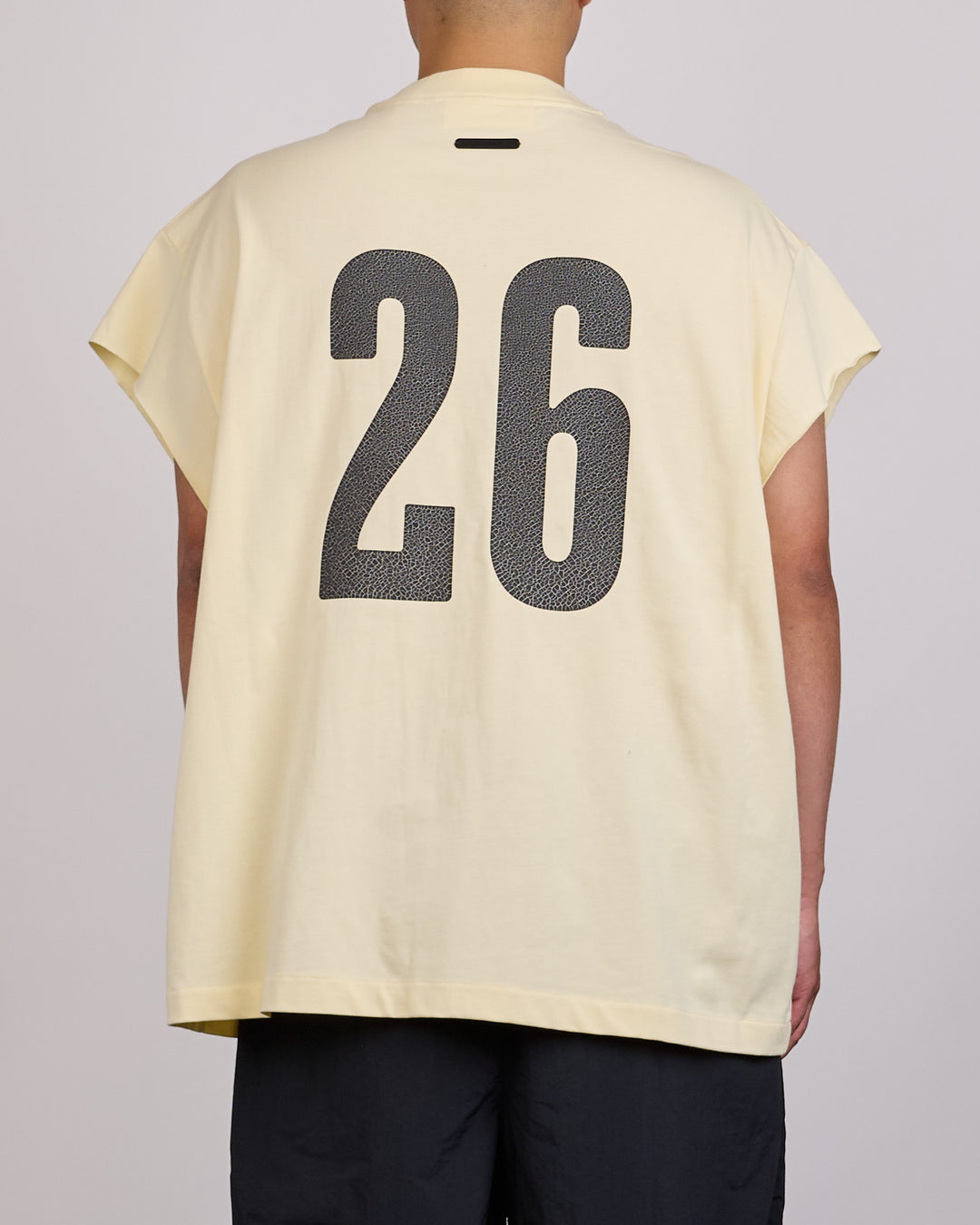 Fear of God Essentials Cut-Off 90's League T-Shirt Chalk
