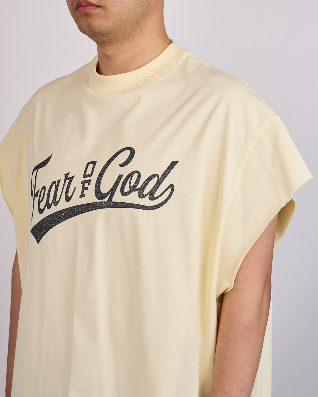 Fear of God Essentials Cut-Off 90's League T-Shirt Chalk