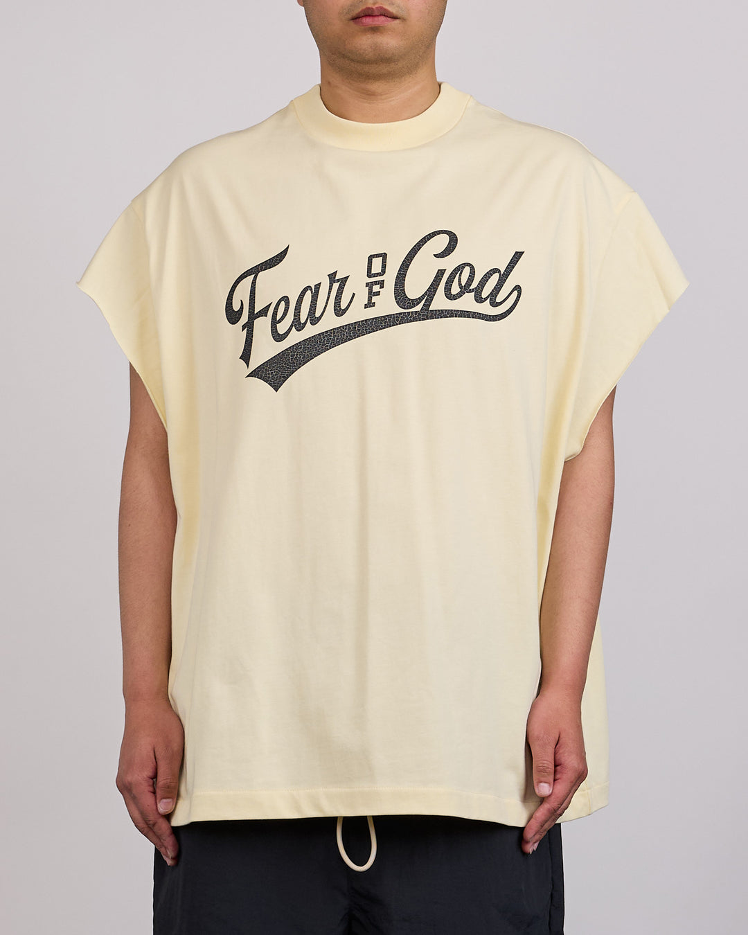 Fear of God Essentials Cut-Off 90's League T-Shirt Chalk