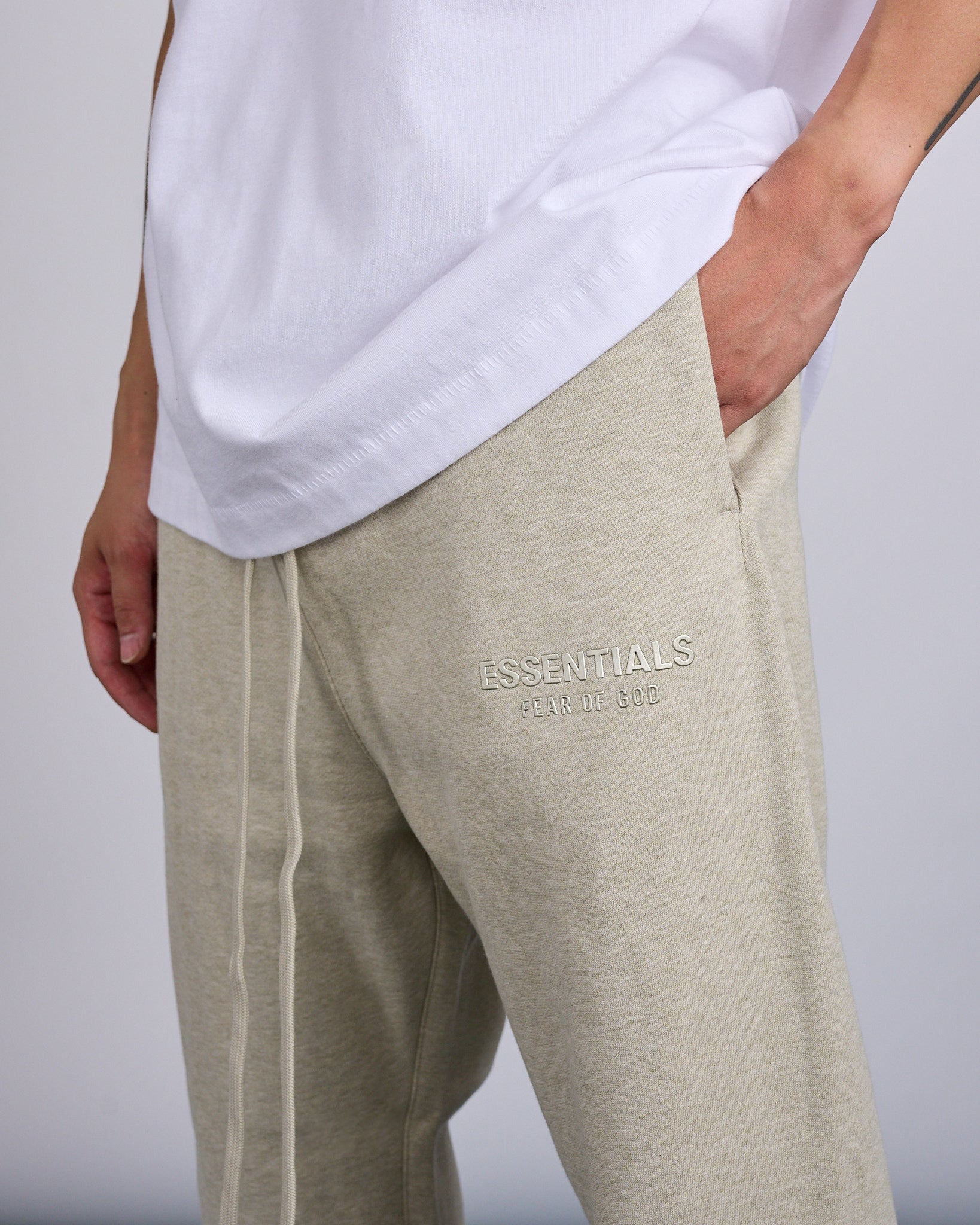Fear of God Essentials Logo Relaxed Sweatpant Heather Stone – LESS 17