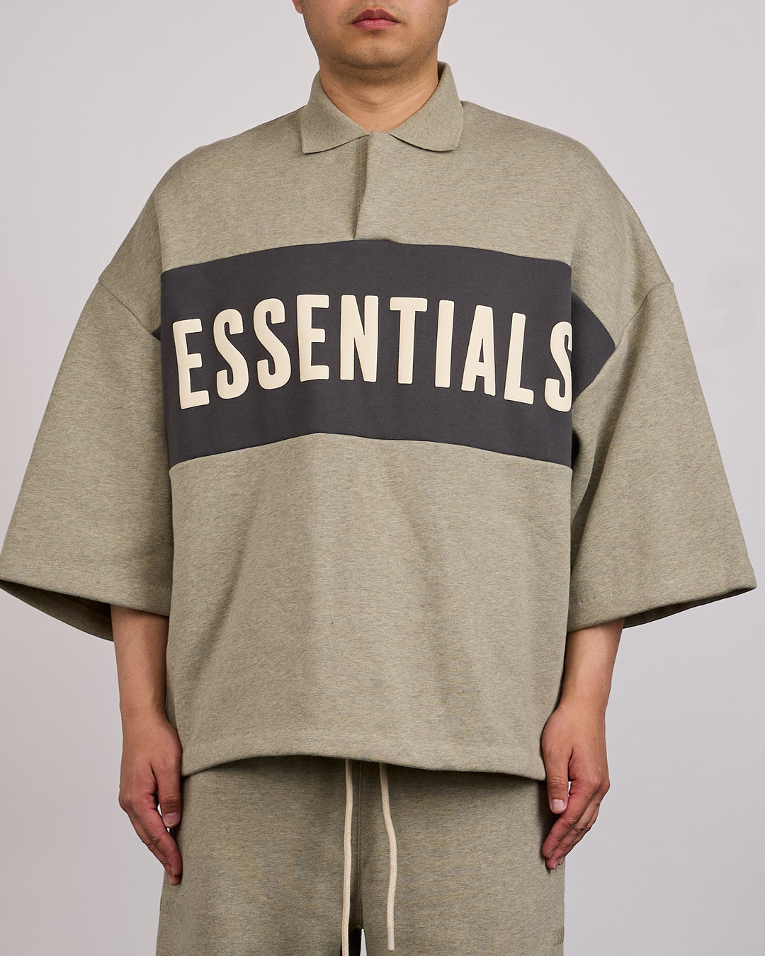 Fear of God Essentials Panelled Cropped Polo Sweat  Seal Heather Iron Grey