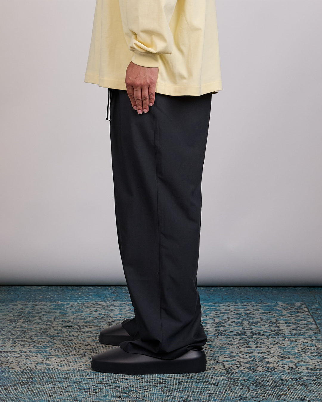 Fear of God Essentials Pleat Front Silk Blend Drawstring Pant Vintage Black
