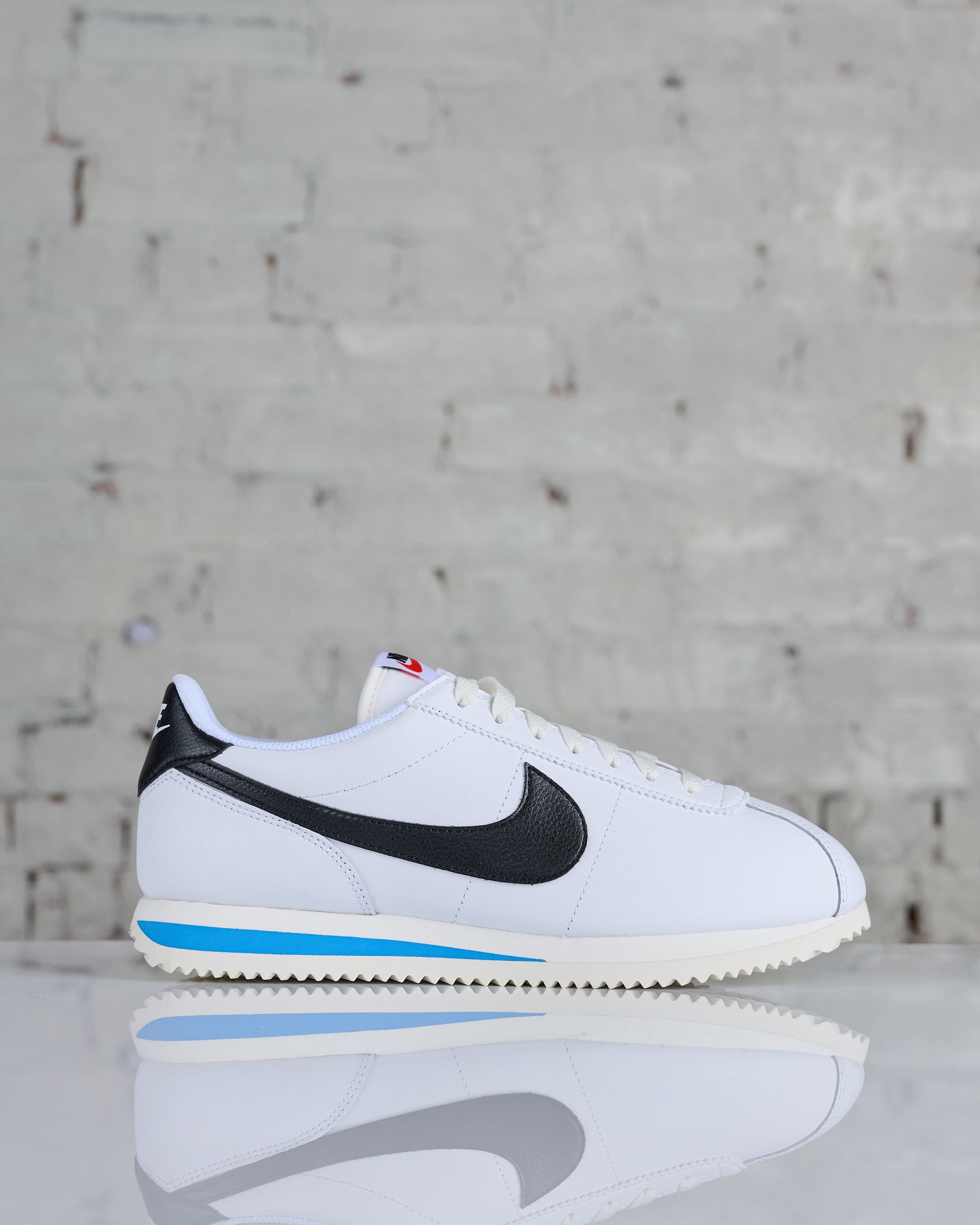 Nike cortez white black leather best sale