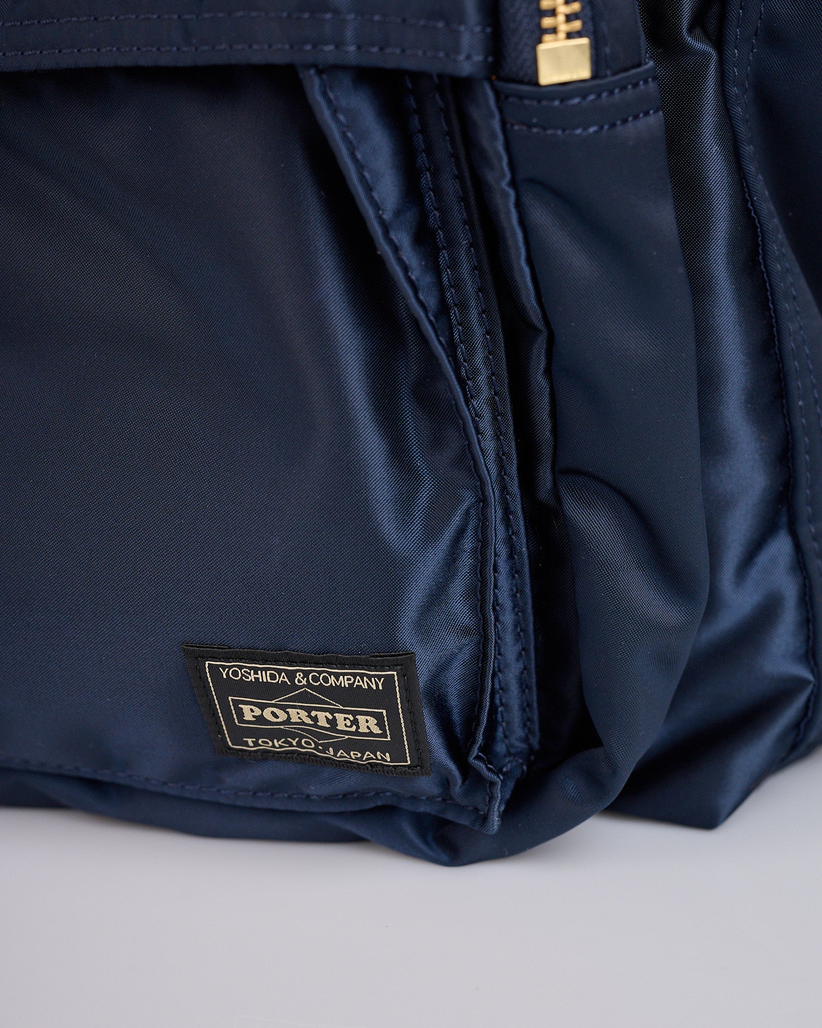 Porter Tanker Zip Front Pocket Daypack Iron Blue – LESS 17