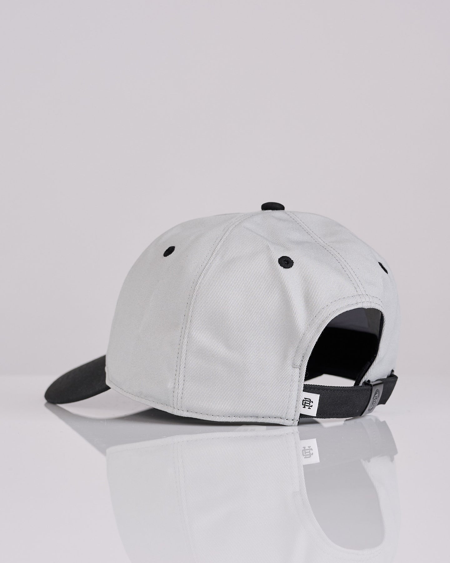 Colour Less Cap Reigning Champ Colourblock Monogram Strapback Cap Concrete-Black – LESS 17