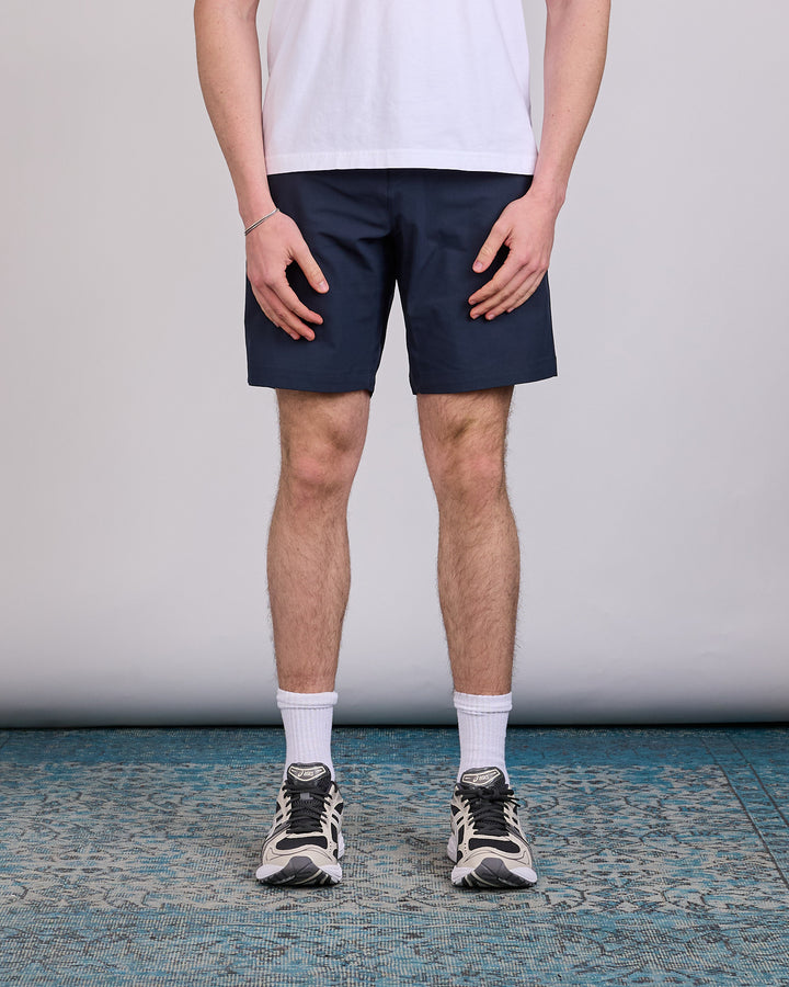 Reigning Champ Stretch Warp Knit 9-Inch Coach's Slim Short Navy