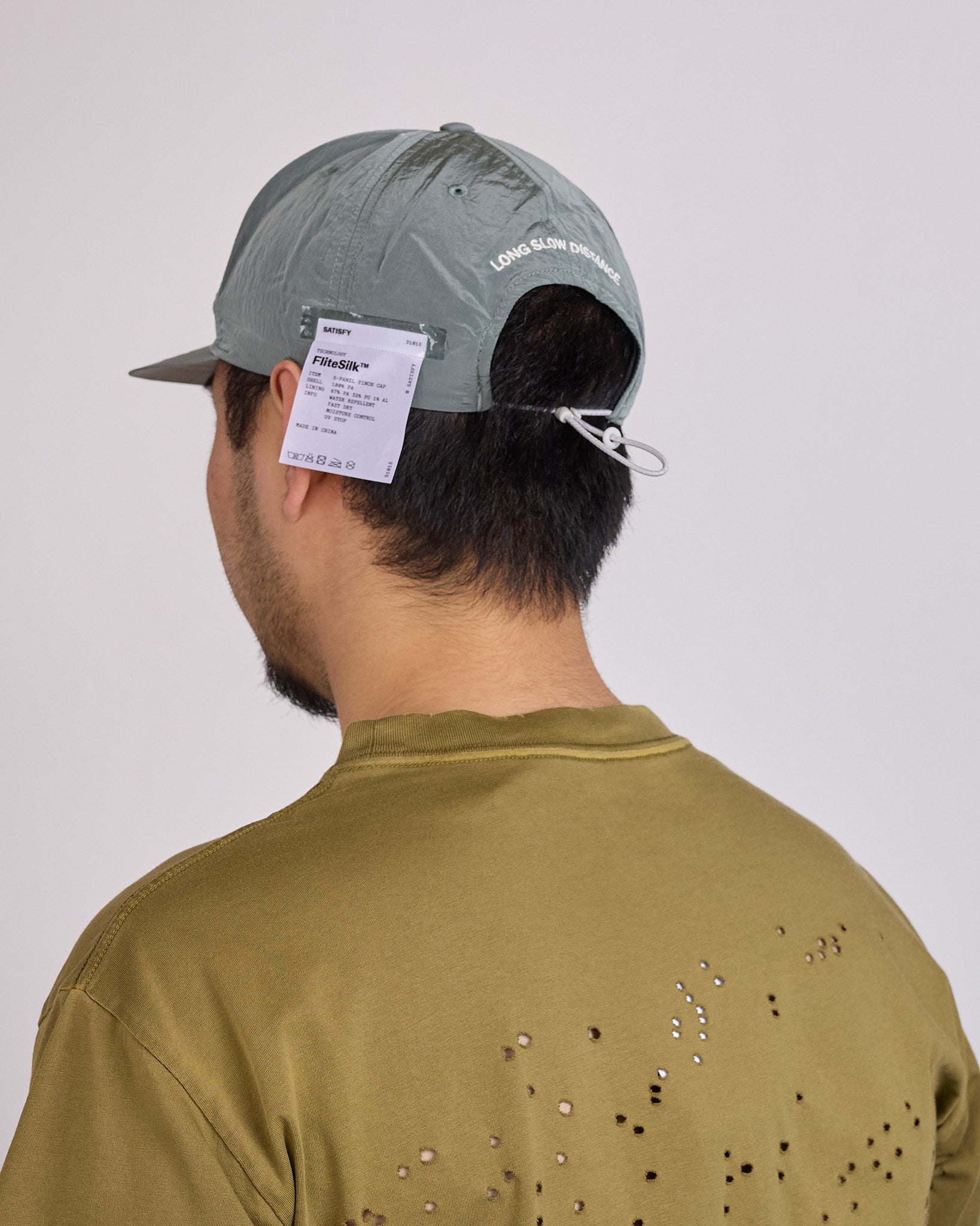 SATISFY FliteSilk LSD 5-Panel Pinch Cap Oil Green – LESS 17