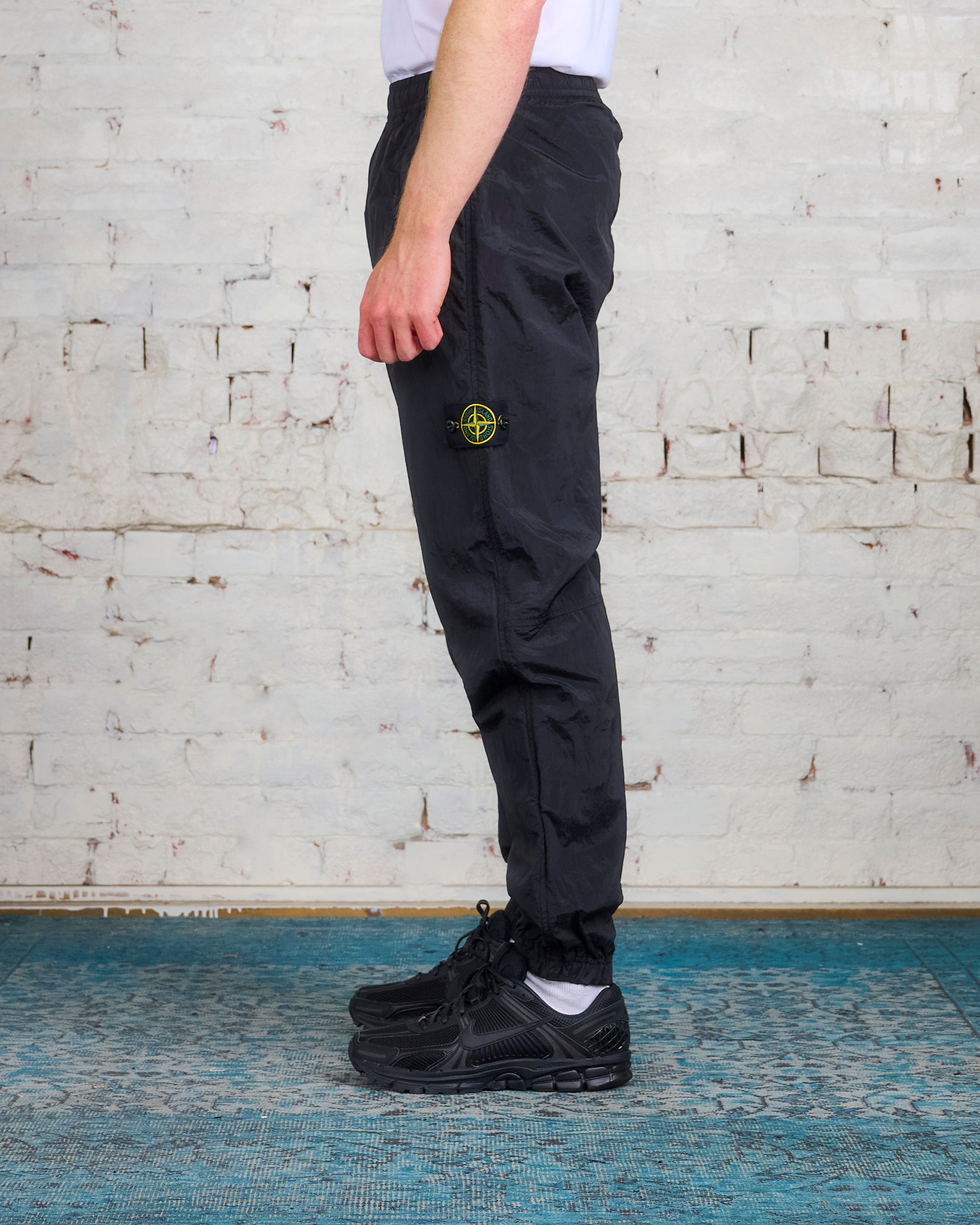 Stone island best sale track pants black