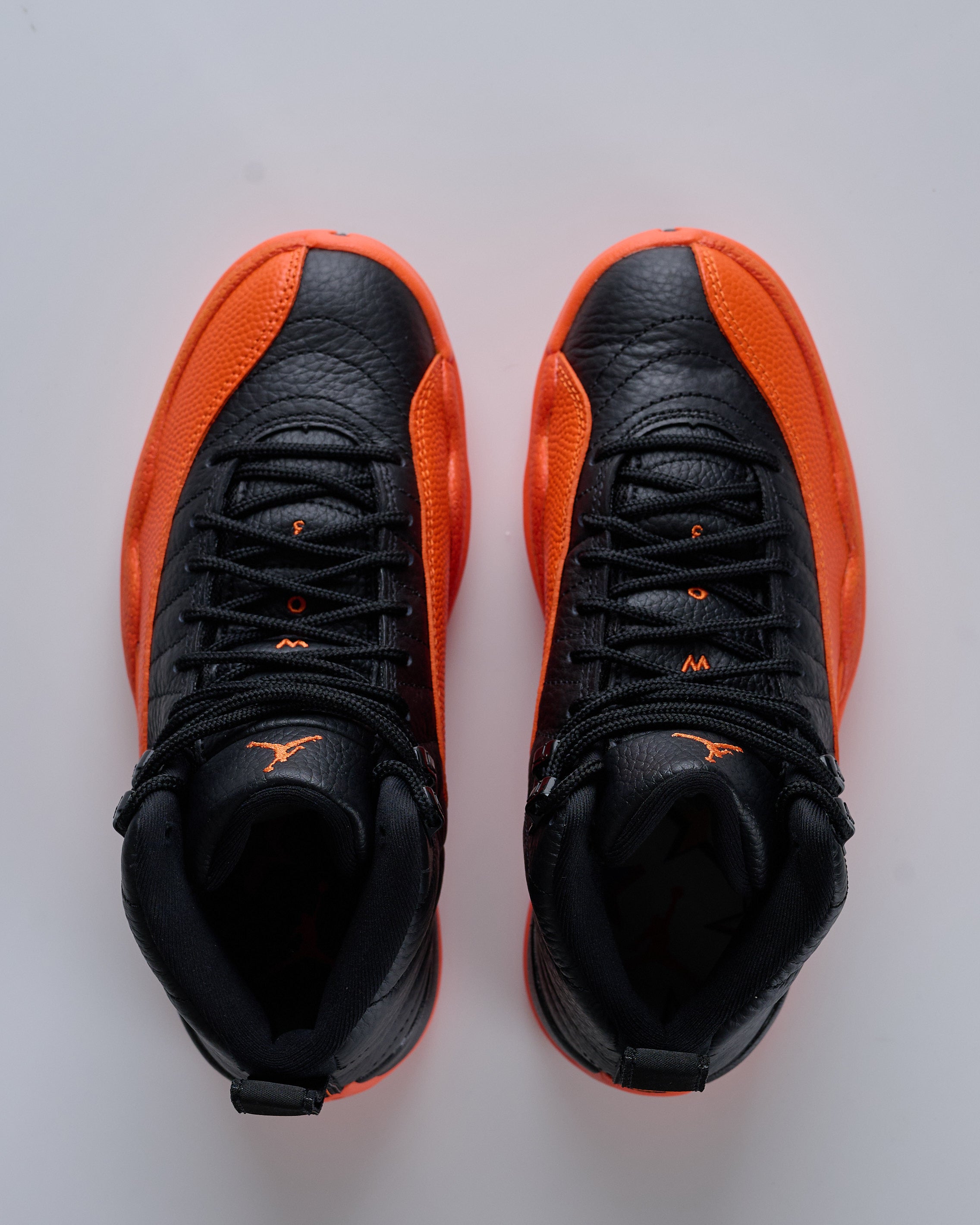 Jordan 12 hot sale black orange