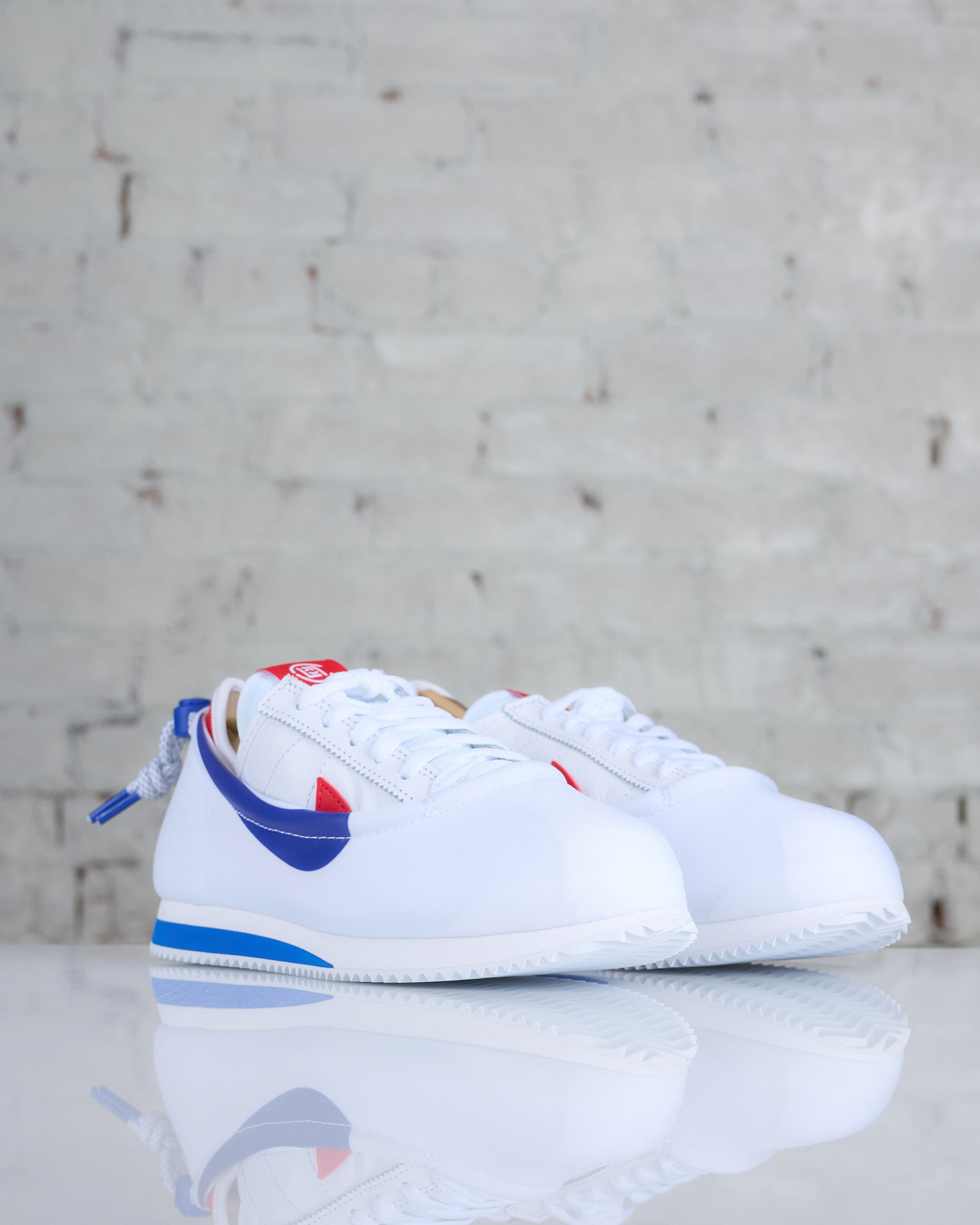 Nike Men's Cortez SP / CLOT White/Game Royal-University Red – LESS 17