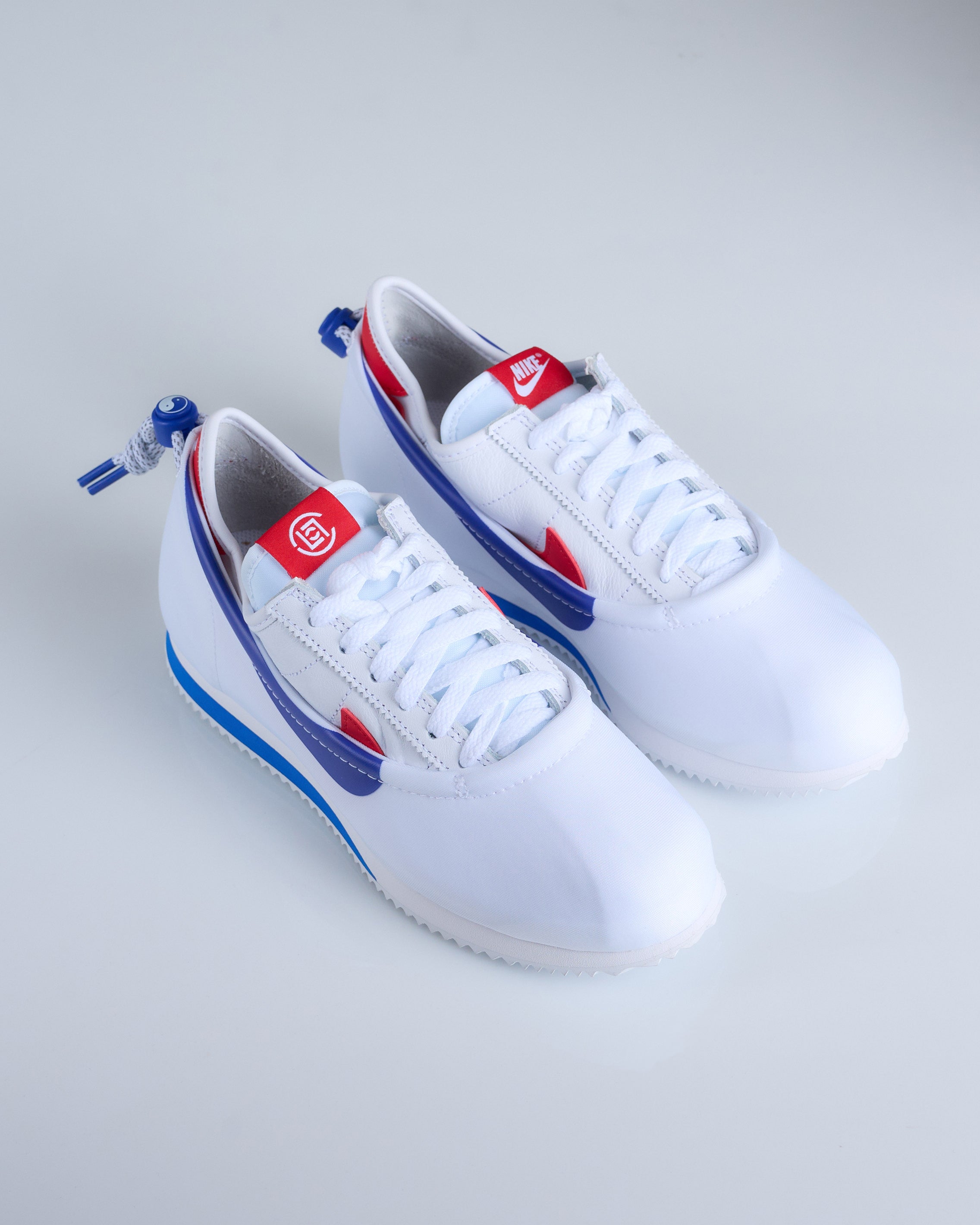 Nike cortez mens hot sale white red blue